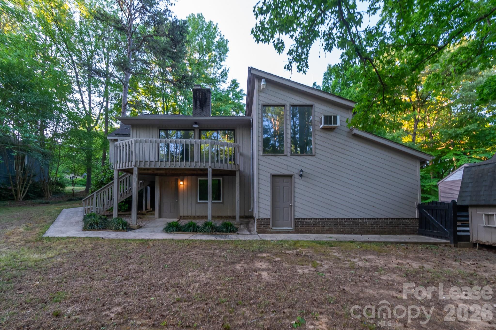 3917 Singletree Road Mint Hill, NC 28227 - Photo 2 of 47 a front view of a house with garden
