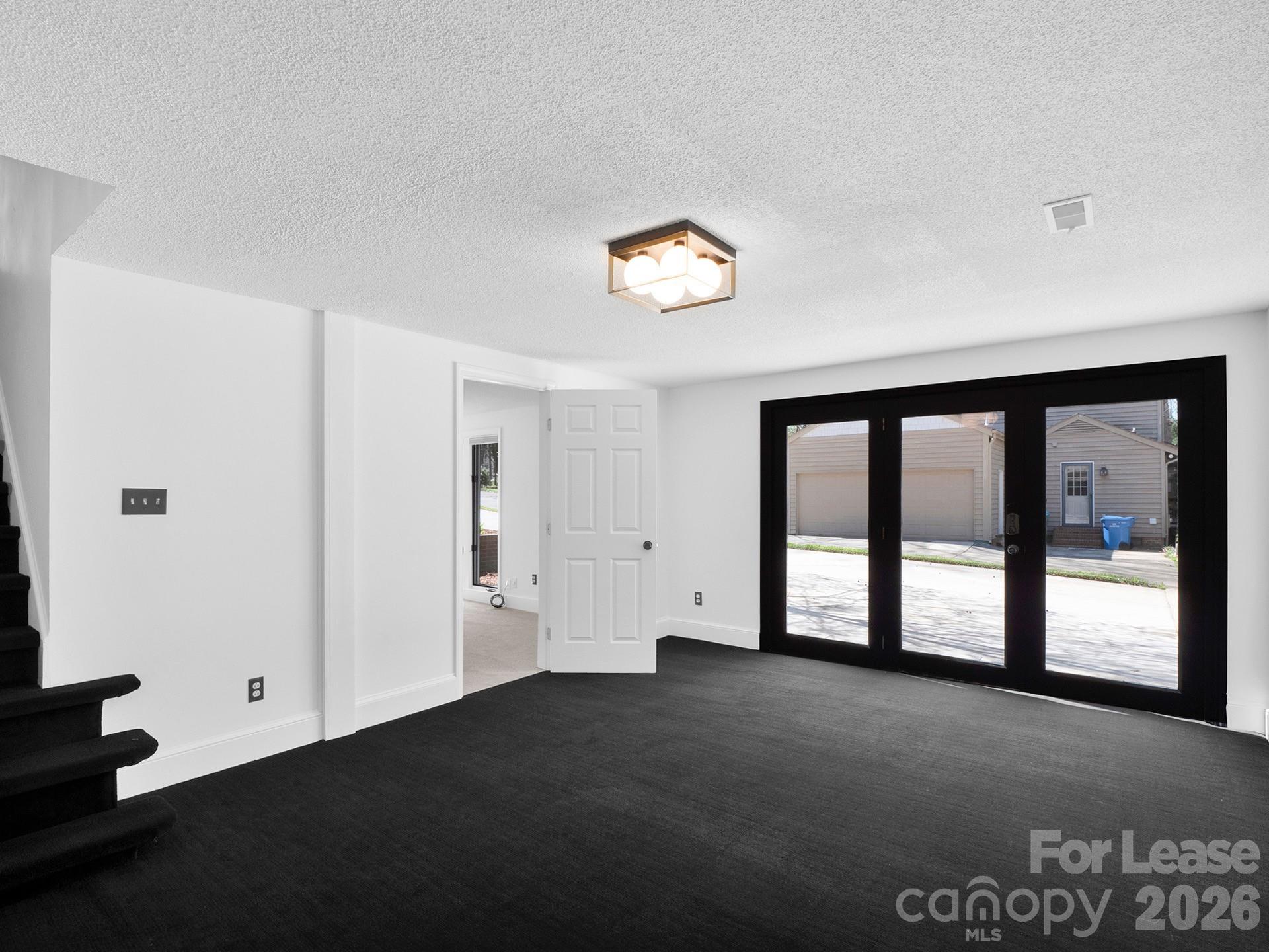3917 Singletree Road Mint Hill, NC 28227 - Photo 35 of 47 a view of an empty room with a window