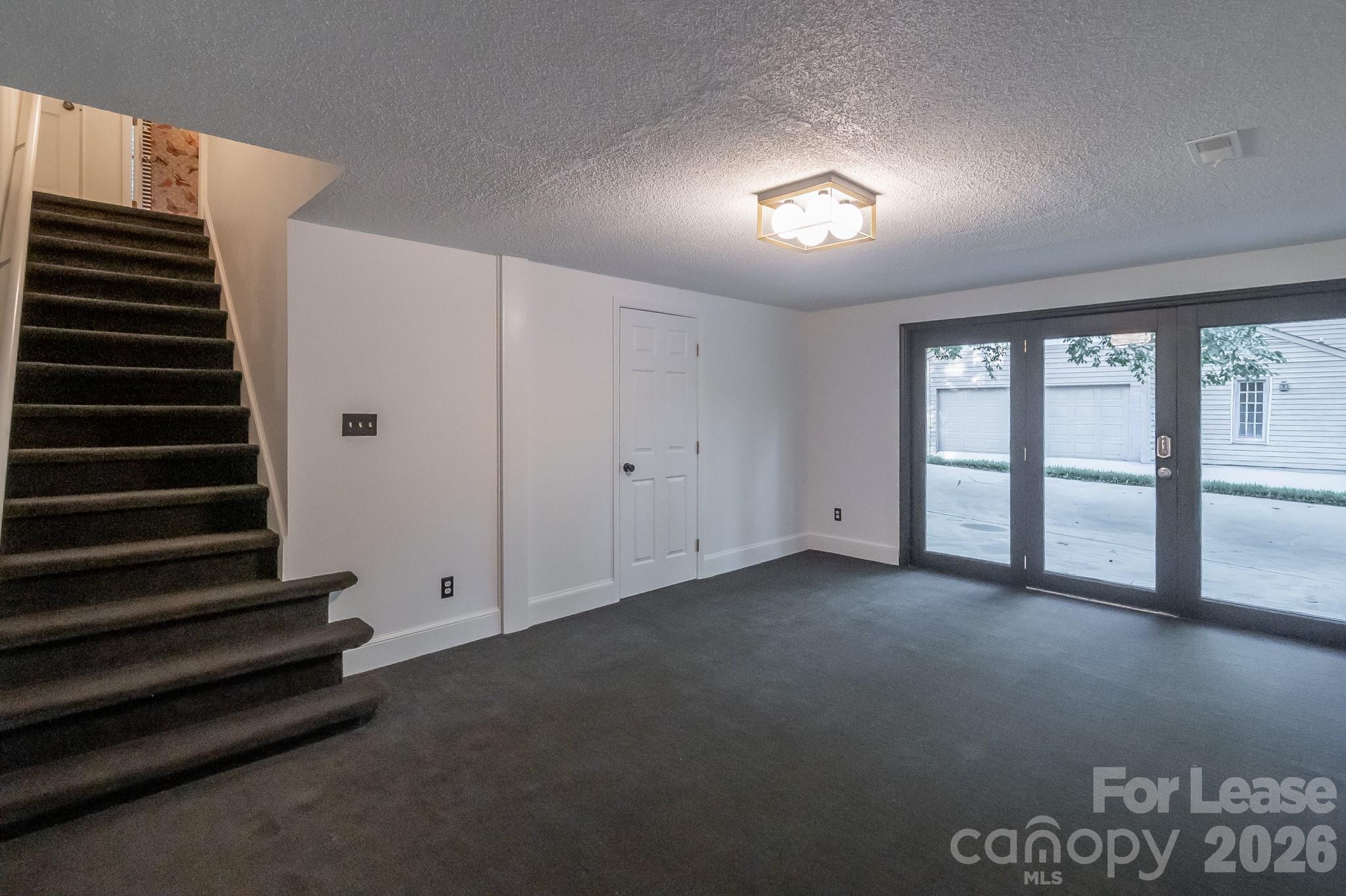 3917 Singletree Road Mint Hill, NC 28227 - Photo 37 of 47 a view of an empty room with a window