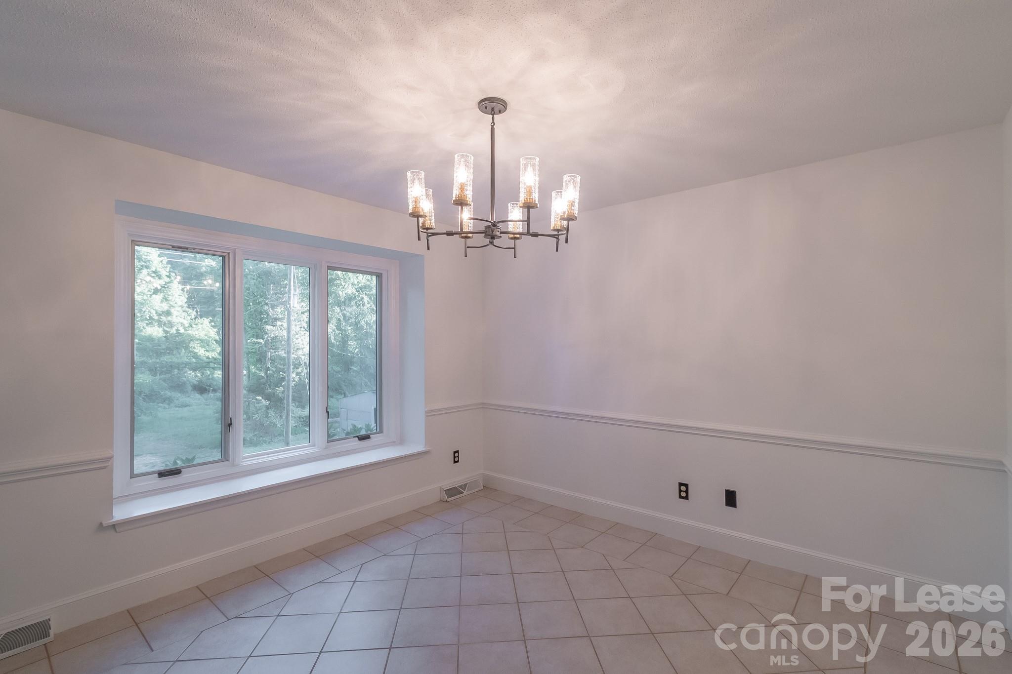 3917 Singletree Road Mint Hill, NC 28227 - Photo 41 of 47 a view of a chandelier in big room and chandelier