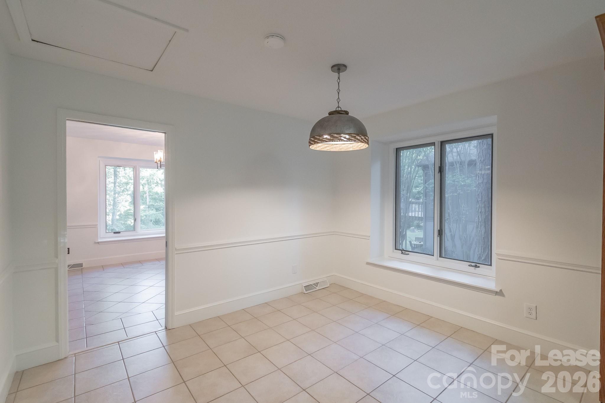 3917 Singletree Road Mint Hill, NC 28227 - Photo 42 of 47 an empty room with windows
