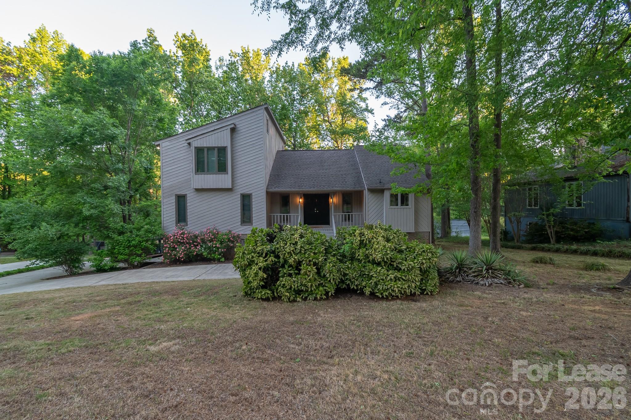 3917 Singletree Road Mint Hill, NC 28227 - Photo 5 of 47 a front view of a house with a garden