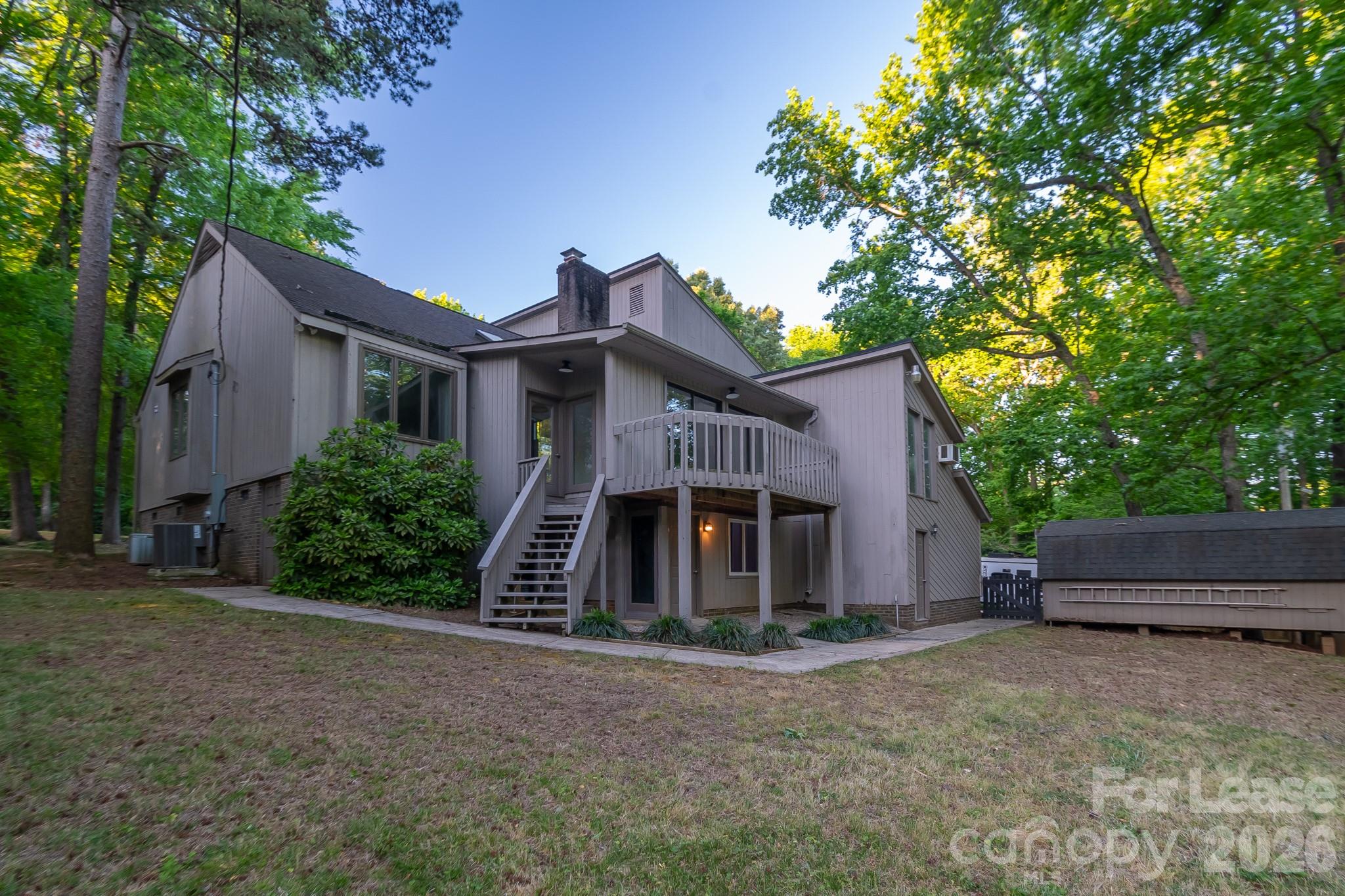 3917 Singletree Road Mint Hill, NC 28227 - Photo 7 of 47 a front view of a house with a garden