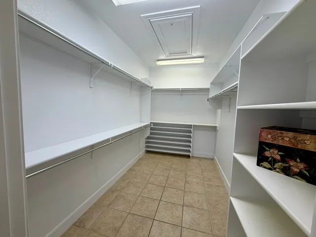 a lamp with potted plant on a table