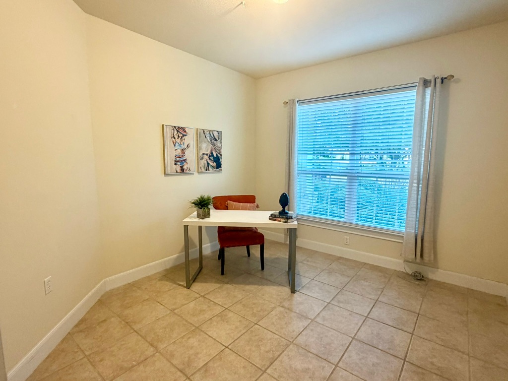 110 Guadalupe Trail Georgetown, TX 78633 - Photo 19 of 27 a view of a workspace with furniture and a window