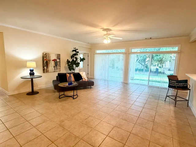 a kitchen with stainless steel appliances granite countertop a sink dishwasher stove and refrigerator