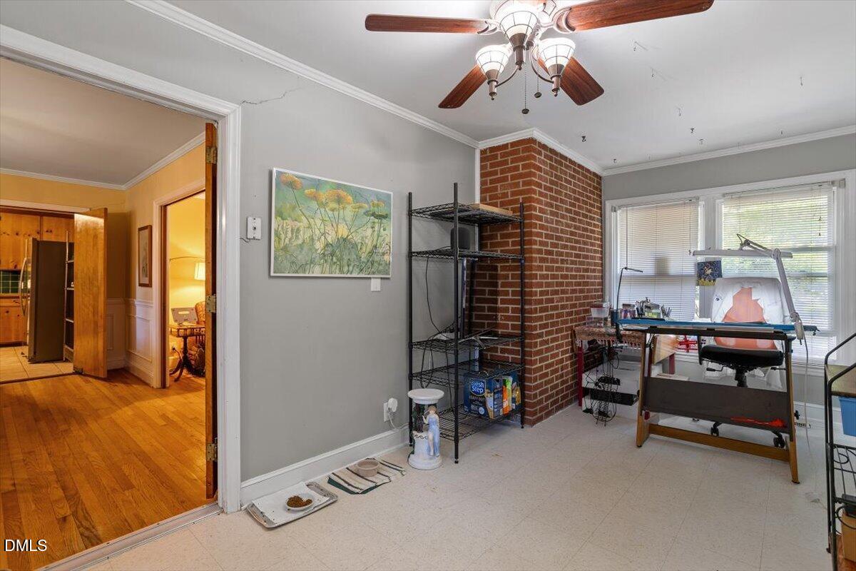 3107 Dixon Road Durham, NC 27707 - Photo 10 of 35 a bedroom with furniture and a window