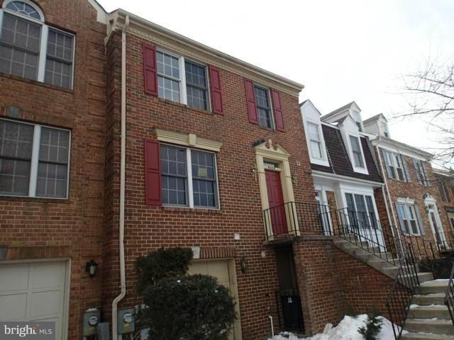 9409 Rosmarin Way Laurel, MD 20708 - Photo 1 of 1 a front view of a house with glass windows