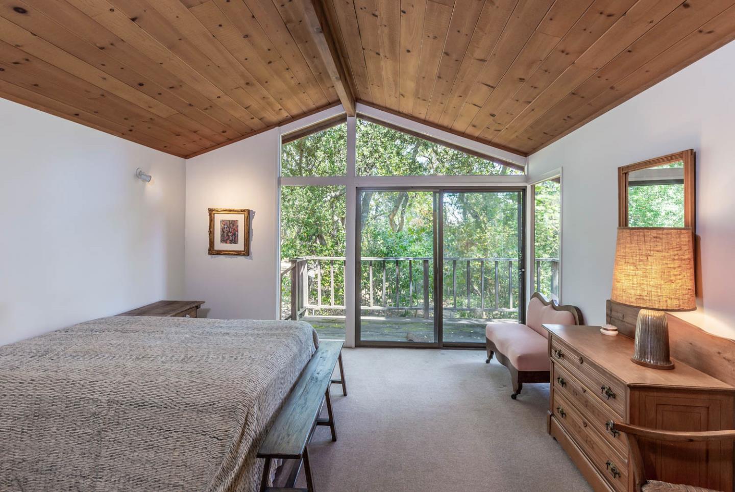 110 Farm Road Woodside, CA 94062 - Photo 19 of 21 a bedroom with a large bed and a large window