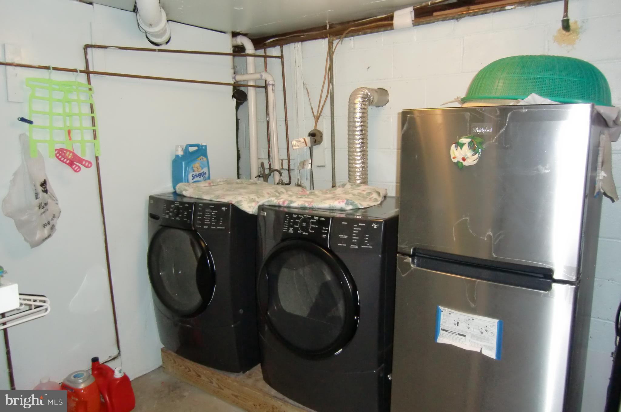 3207 Bryant Avenue Halethorpe, MD 21227 - Photo 10 of 11 a utility room with dryer and washer