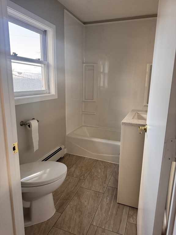 66 Taylor Street, Unit 2 Holyoke, MA 01040 - Photo 15 of 29 a bathroom with a toilet and a shower