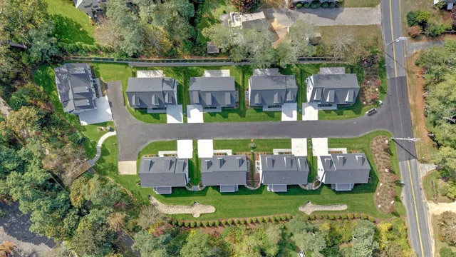 an aerial view of a house with a garden