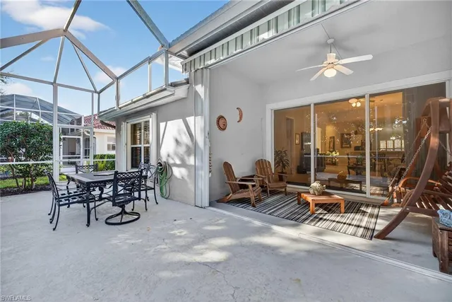a view of a livingroom with furniture and a window