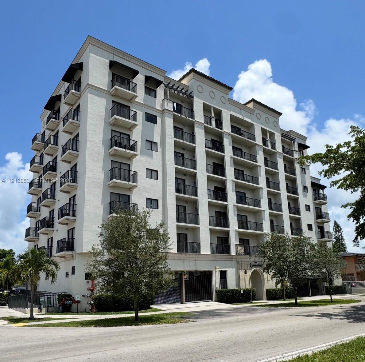 1801 Southwest 32nd Avenue, Unit 504 Miami, FL 33145 - Photo 1 of 14 a view of a building with a street