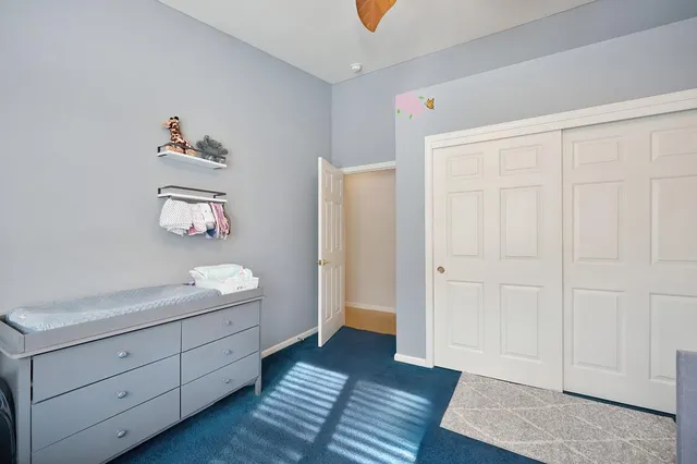 a view of a hallway with a white walls