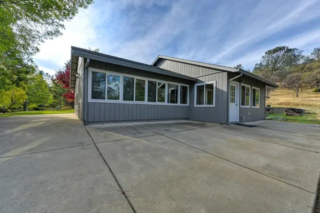 a view of field with trees