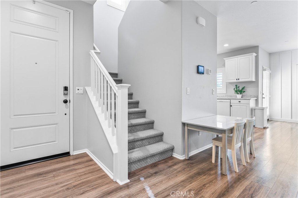 35114 Persano Place Fallbrook, CA 92028 - Photo 16 of 45 a view of entryway and hall with wooden floor