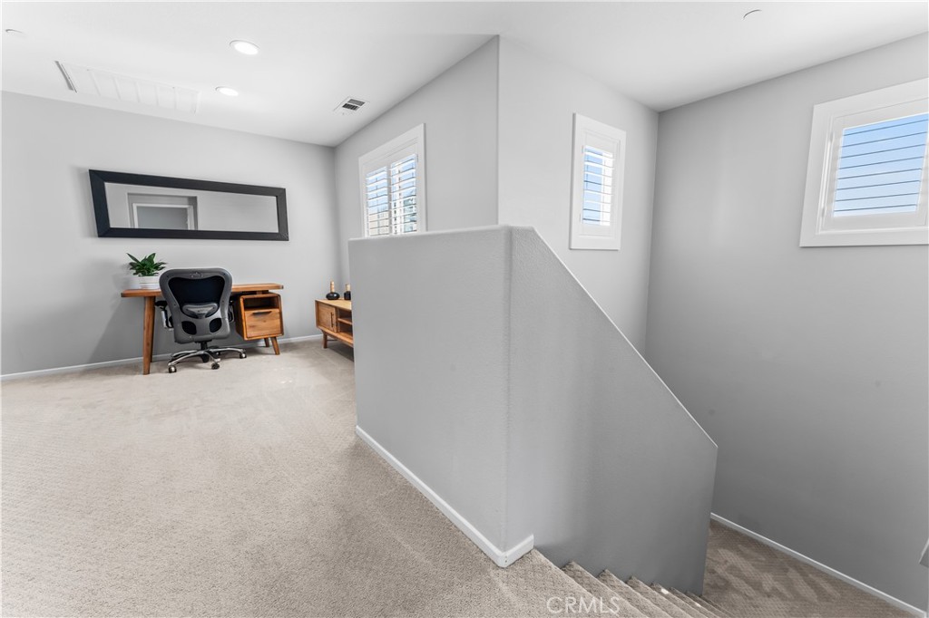 35114 Persano Place Fallbrook, CA 92028 - Photo 17 of 45 a view of a livingroom with furniture and a window