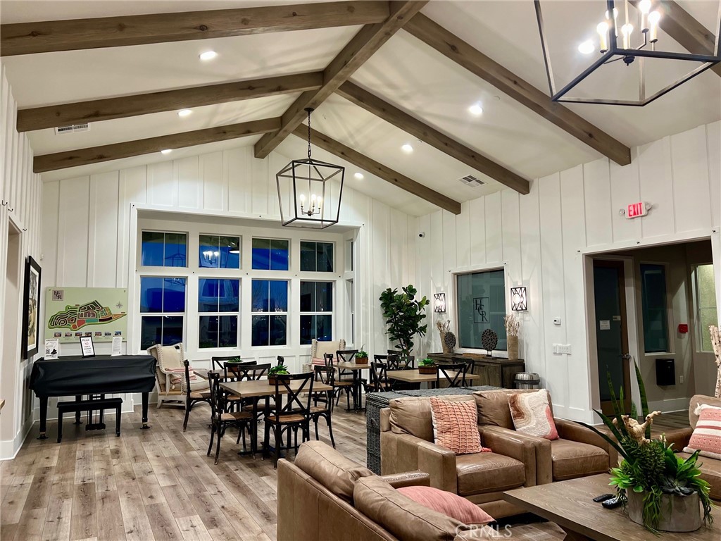 35114 Persano Place Fallbrook, CA 92028 - Photo 42 of 45 a living room with fireplace furniture and a potted plant