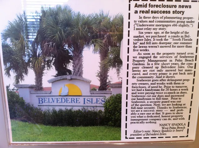 a sign that is on the side of the tree