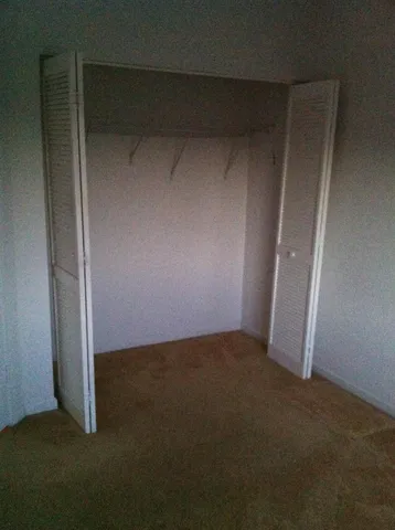 an empty room with closet