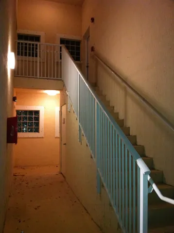 a sign that is on a brick building