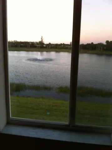 a view of a lake from a balcony