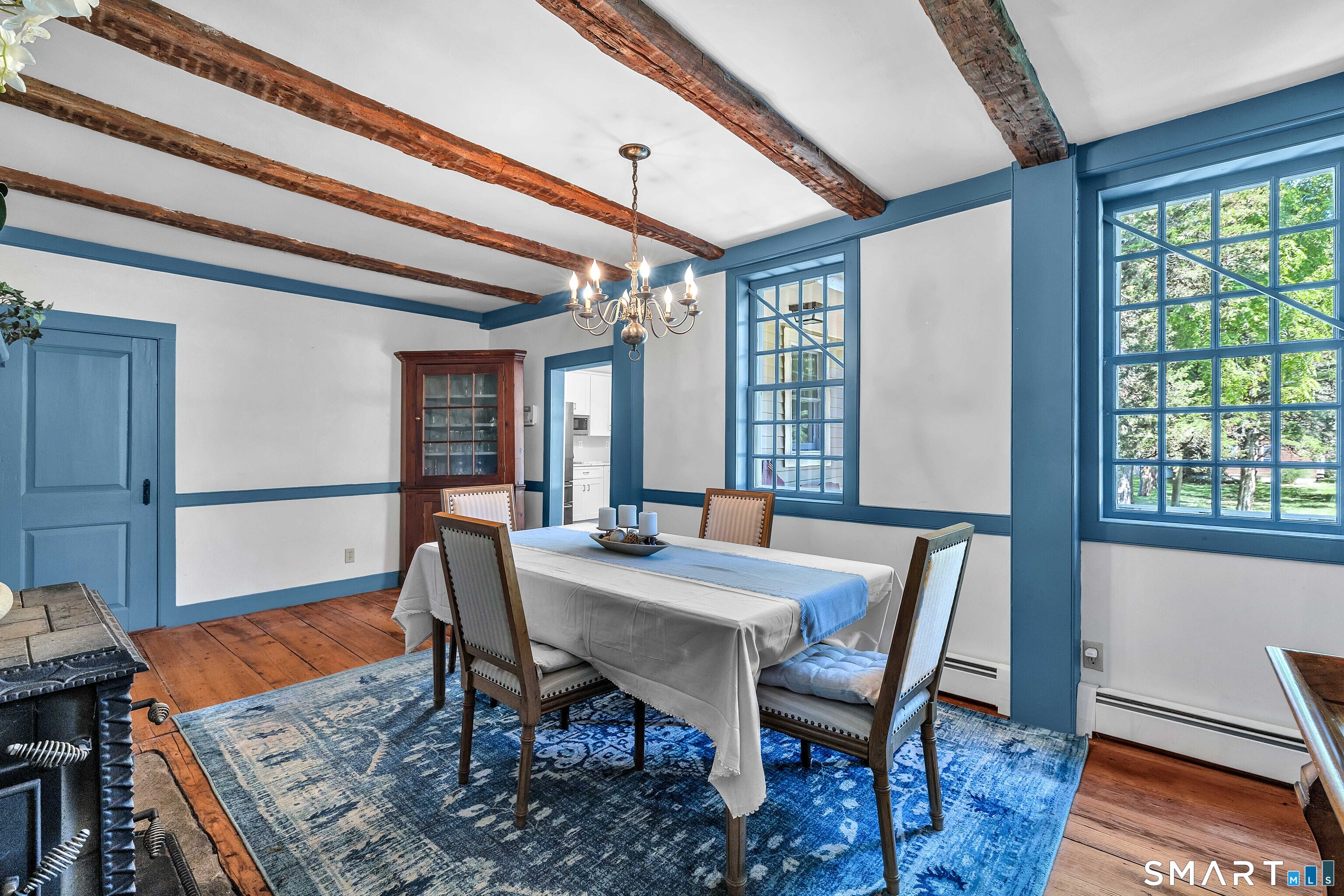 448 Grove Beach Road North Westbrook, CT 06498 - Photo 18 of 38 a view of a dining room with furniture window and wooden floor