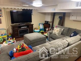 344 Union Avenue Middlesex, NJ 08846 - Photo 11 of 22 a living room with furniture and a flat screen tv