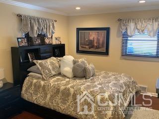 344 Union Avenue Middlesex, NJ 08846 - Photo 13 of 22 a bedroom with a bed and cupboard