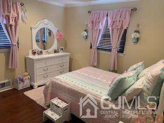 344 Union Avenue Middlesex, NJ 08846 - Photo 16 of 22 a bedroom with a bed and a mirror