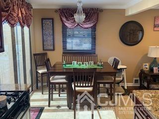 344 Union Avenue Middlesex, NJ 08846 - Photo 7 of 22 a dining room with furniture and wooden floor