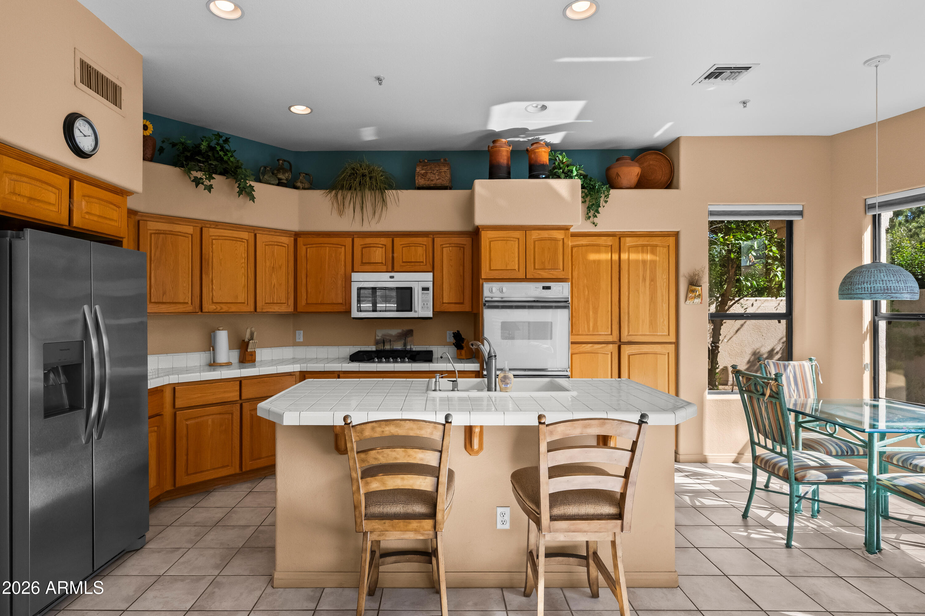 7525 East Gainey Ranch Road, Unit 114 Scottsdale, AZ 85258 - Photo 11 of 25 Kitchen Island