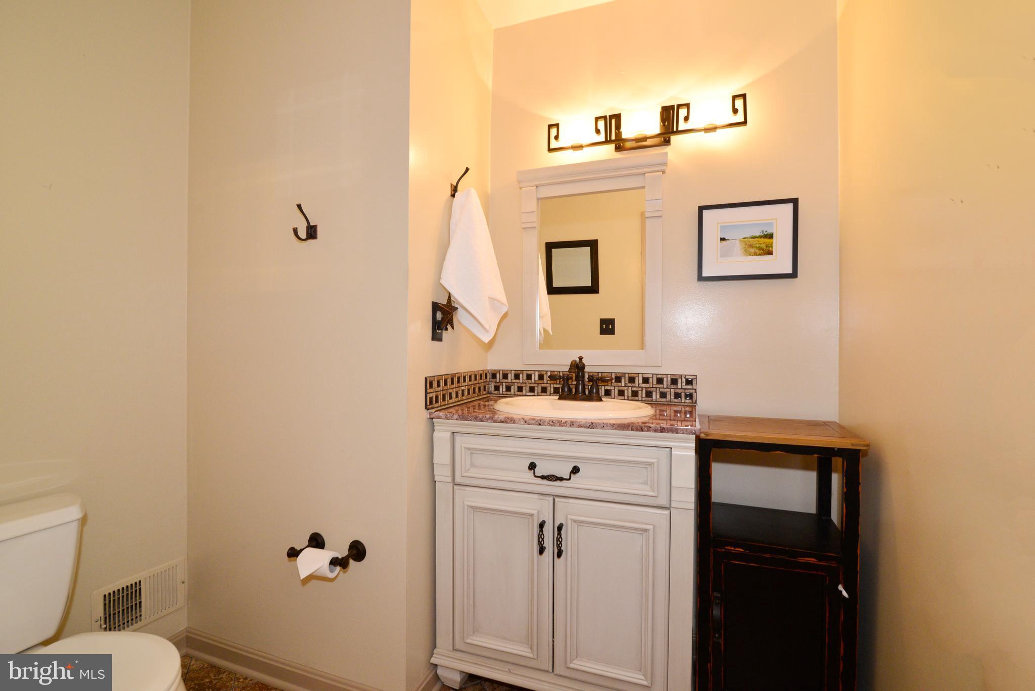 11480 Bingham Terrace Reston, VA 20191 - Photo 25 of 48 Upgraded Main Level Powder Room.