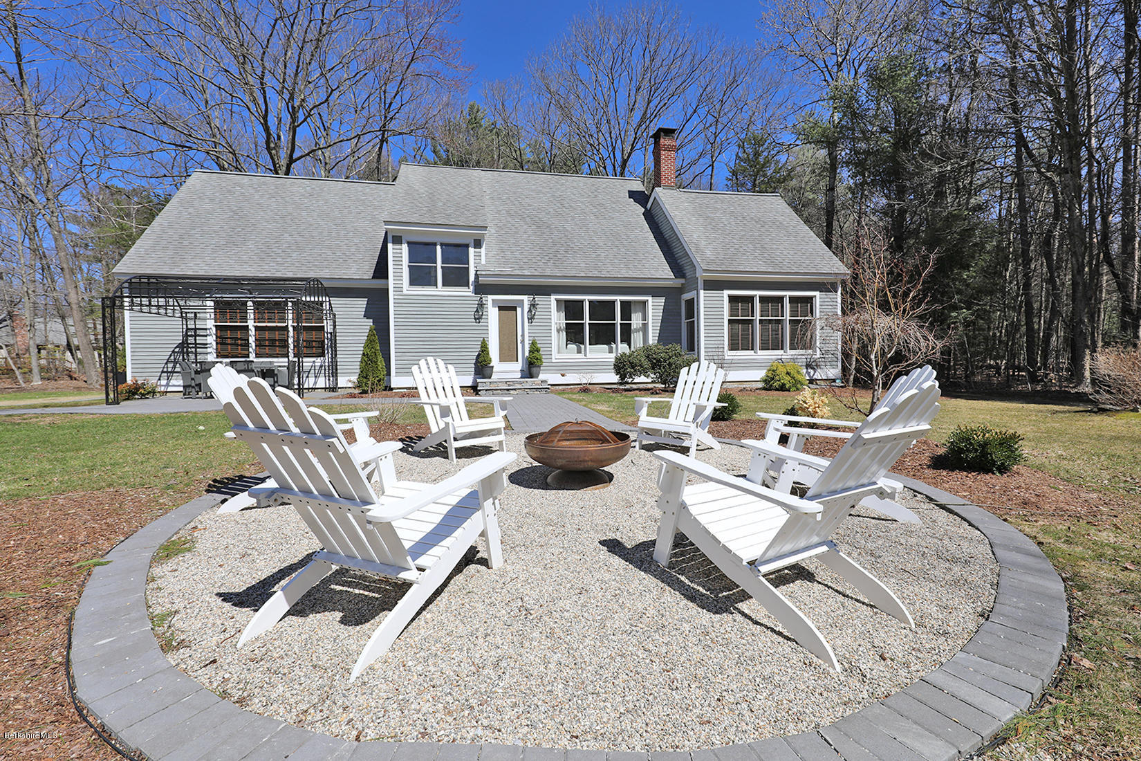 183 Judd Road Otis, MA 01253 - Photo 1 of 38 a view of a house with backyard porch and sitting area
