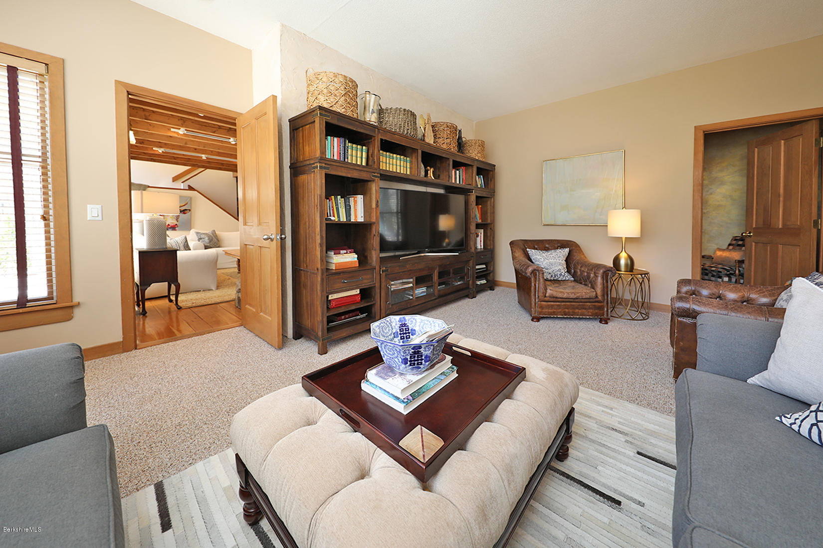 183 Judd Road Otis, MA 01253 - Photo 8 of 38 a living room with furniture and a flat screen tv