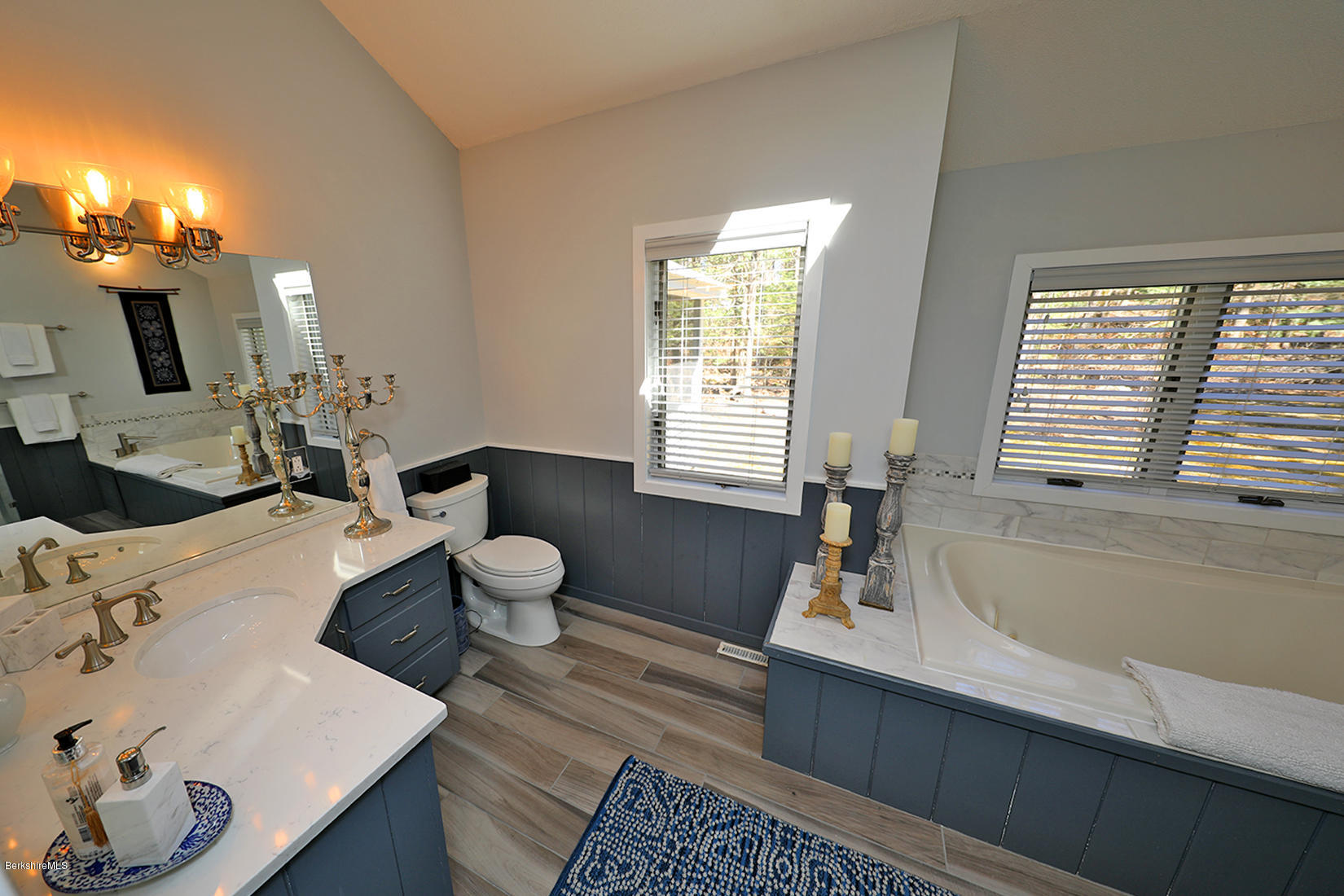183 Judd Road Otis, MA 01253 - Photo 11 of 38 a living room with furniture and a large window