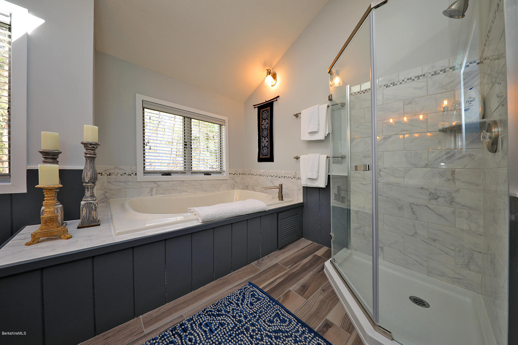 183 Judd Road Otis, MA 01253 - Photo 12 of 38 a bathroom with a double vanity sink toilet and shower