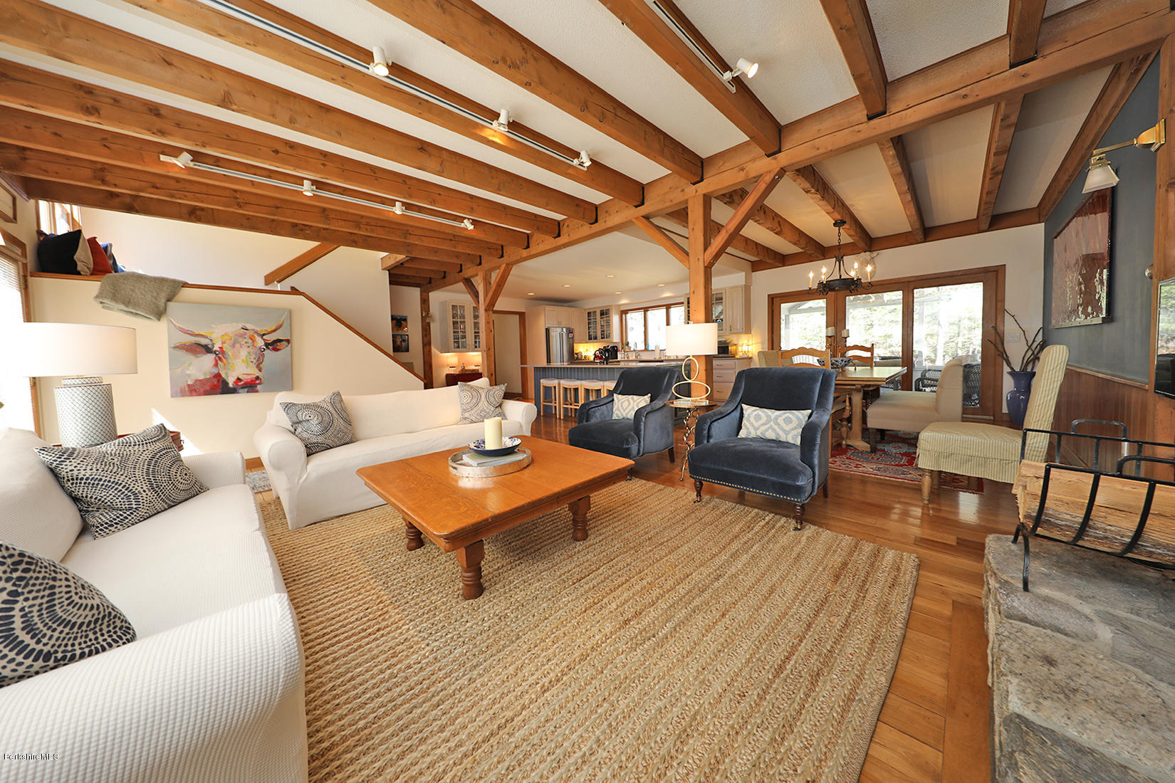 183 Judd Road Otis, MA 01253 - Photo 37 of 38 a living room with furniture and wooden floors