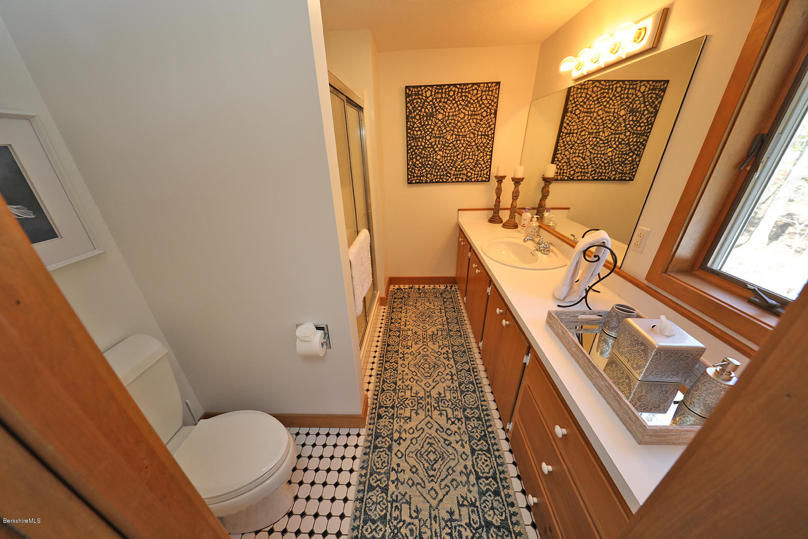 183 Judd Road Otis, MA 01253 - Photo 20 of 38 a bathroom with a sink and a mirror