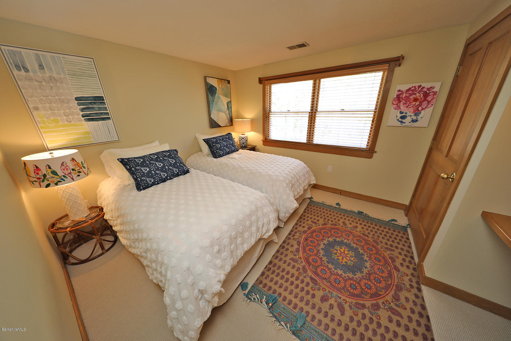 183 Judd Road Otis, MA 01253 - Photo 24 of 38 a bedroom with a bed and wooden floor