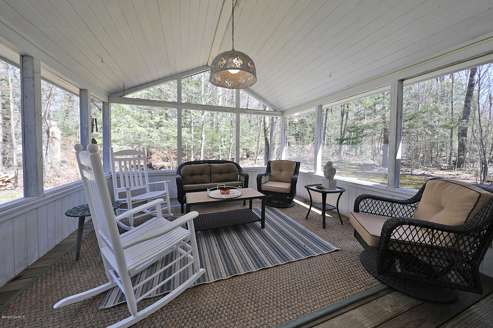 183 Judd Road Otis, MA 01253 - Photo 27 of 38 a living room with furniture and a large window