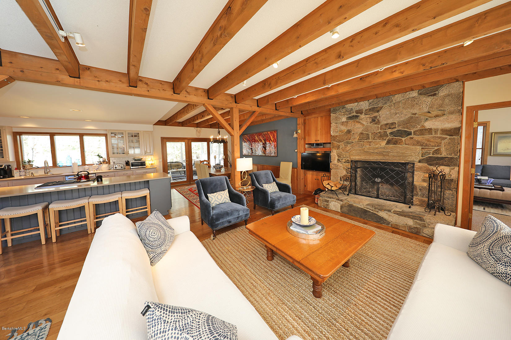 183 Judd Road Otis, MA 01253 - Photo 38 of 38 a living room with furniture and a fireplace