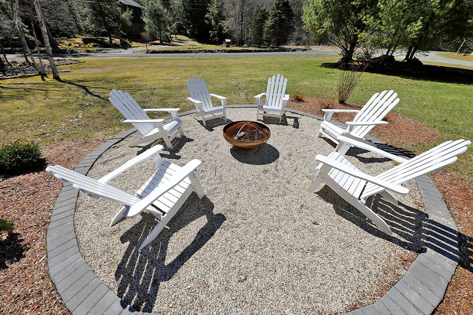 183 Judd Road Otis, MA 01253 - Photo 29 of 38 a view of a swimming pool with lounge chairs in patio