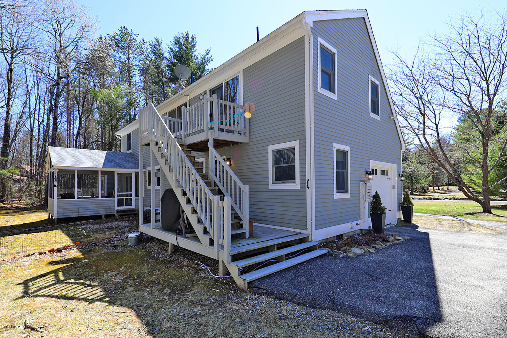 183 Judd Road Otis, MA 01253 - Photo 33 of 38 front view of a house with a yard
