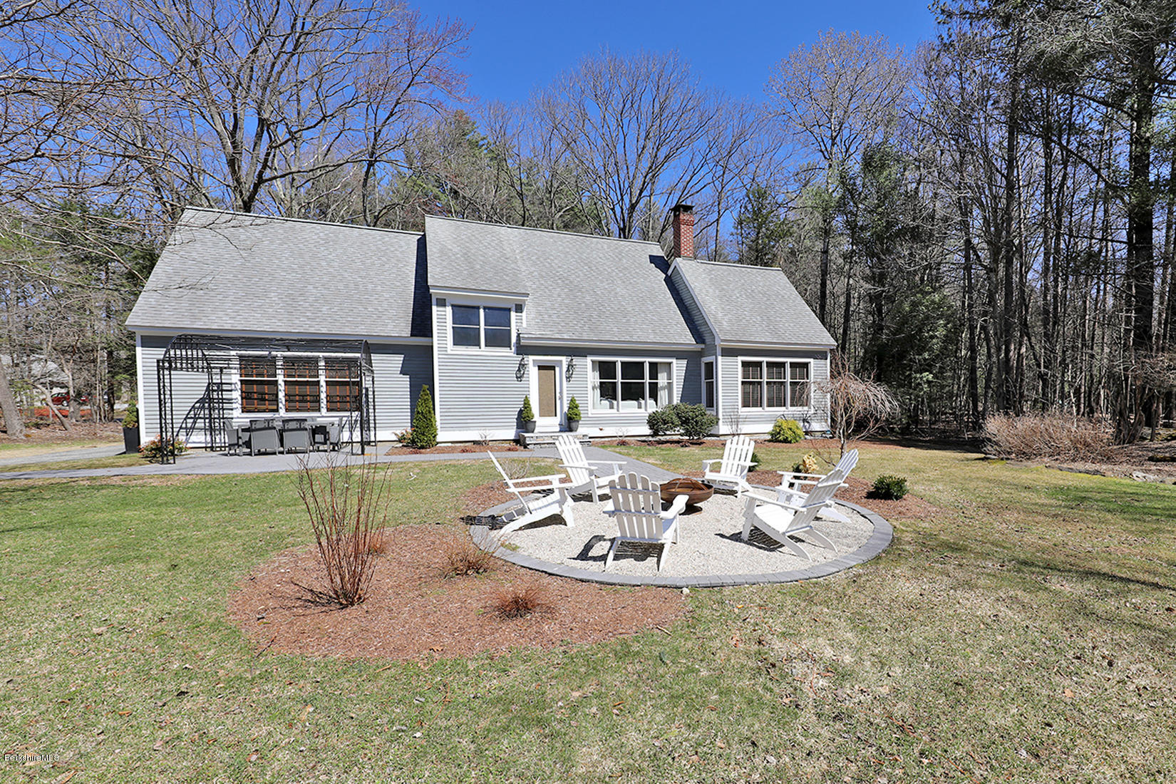 183 Judd Road Otis, MA 01253 - Photo 35 of 38 a view of a house with backyard and sitting area