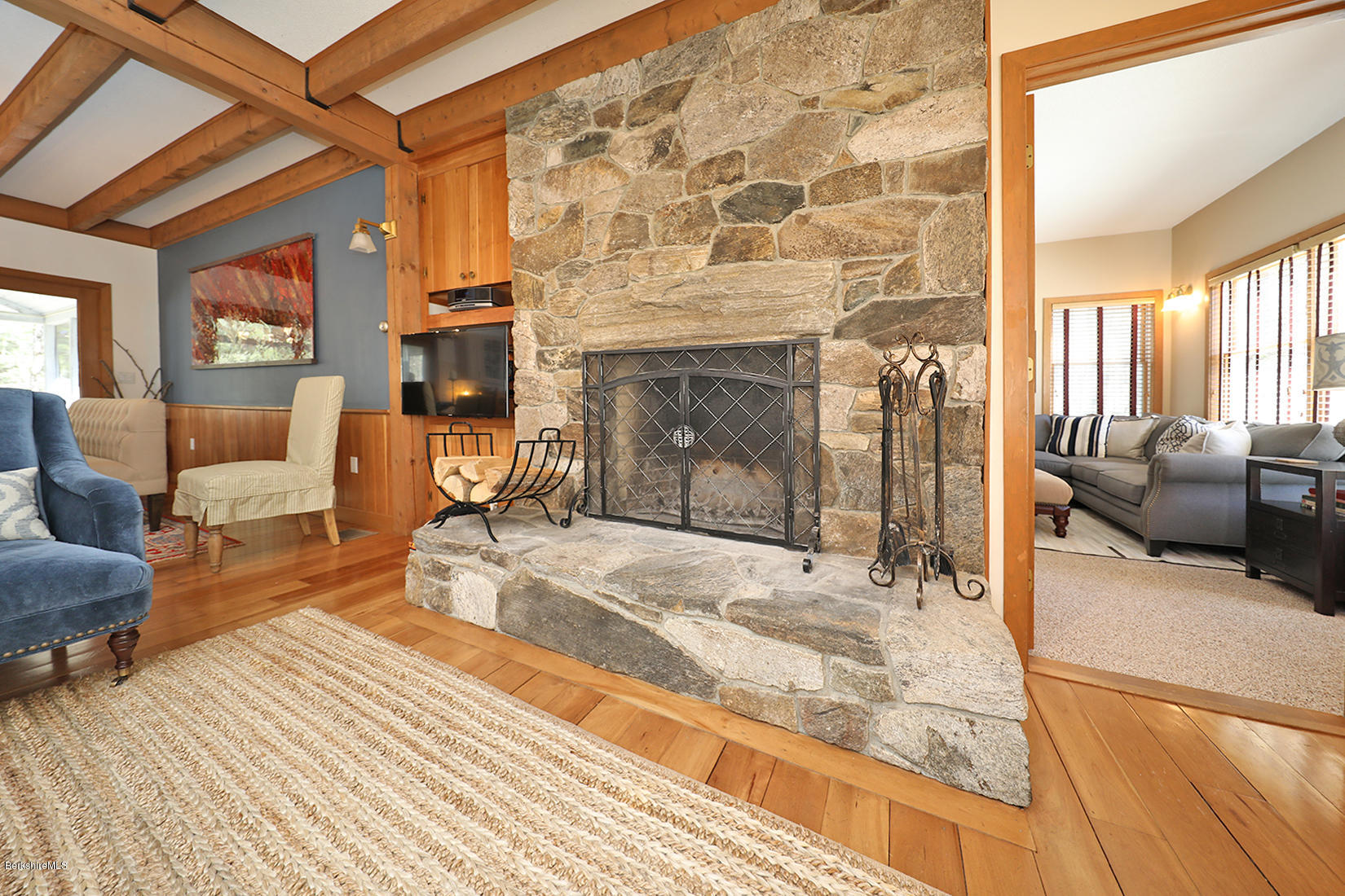 183 Judd Road Otis, MA 01253 - Photo 2 of 38 a view of a livingroom with furniture and a fireplace