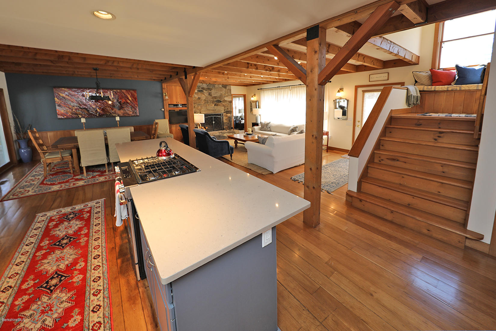 183 Judd Road Otis, MA 01253 - Photo 6 of 38 a open kitchen with stainless steel appliances granite countertop a stove and a wooden floors