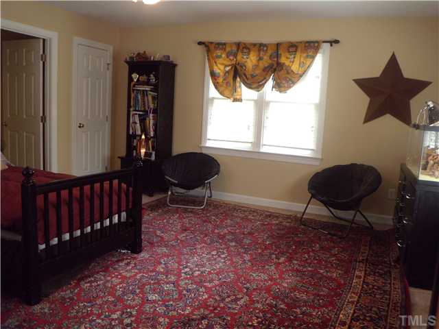 3809 La Costa Way Raleigh, NC 27610 - Photo 16 of 25 a living room with furniture and a window