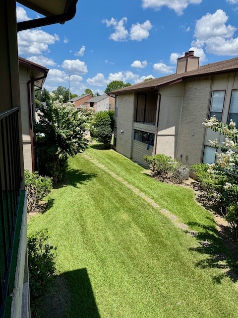9229 Imogene Street, Unit 9229 Houston, TX 77036 - Photo 11 of 24 a front view of a house with garden